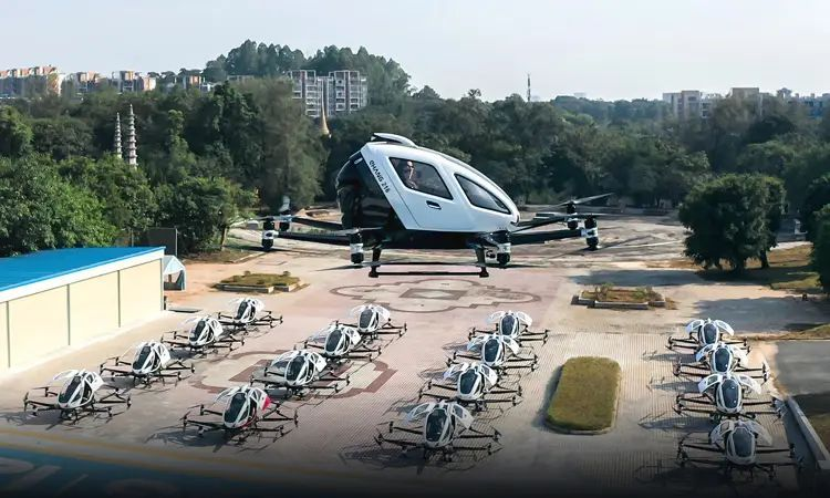 EHang EH216-S eVTOL flying over an urban environment